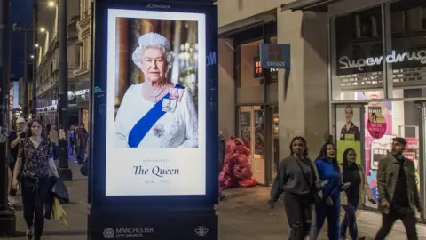 Getty Images A digital advertising board in Piccadilly Gardens shows an image of Queen Elizabeth II