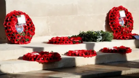 PA Media Poppy wreaths at the Cenotaph