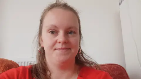 Eleanor Button A picture of Eleanor Button in front of a white wall