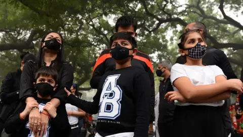 Getty Images Indian protesters wearing protective masks take part in a rally urging immediate action to curb air pollution in New Delhi on November 6, 2016