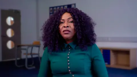 BBC News Social worker Barizoge in a classroom