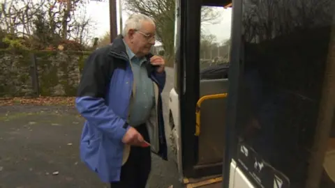 Photo of Hywel Jones catching his local bus