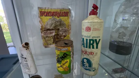 Mike Liggins/BBC Items of litter in the litter museum