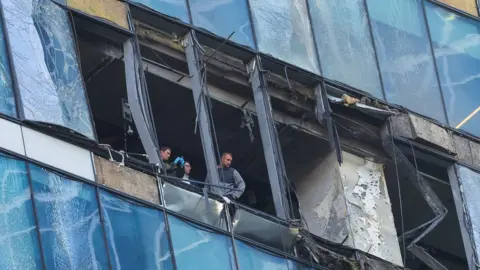 Reuters The damaged office building in Moscow