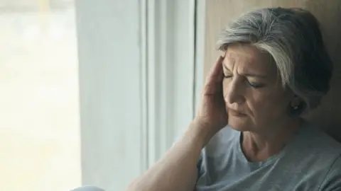 Getty Images Exhausted woman