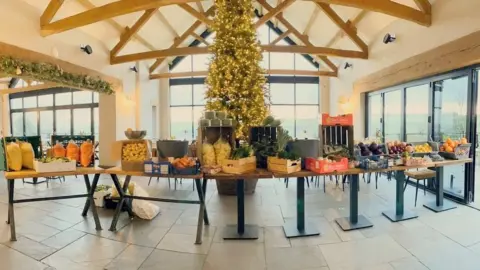 Steffan Jones Table of donated food at the Old House pub