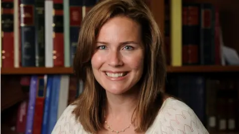 Reuters Judge Amy Coney Barrett poses in an undated photograph obtained from Notre Dame University