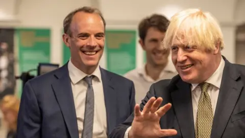 Getty Images Former prime minster Boris Johnson is pictured alongside then-foreign justice secretary Dominic Raab in 2021