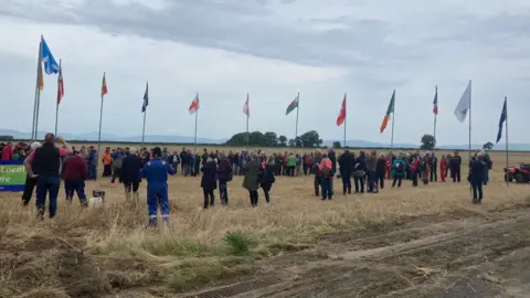 Flags representing the various nationalities taking part were on display