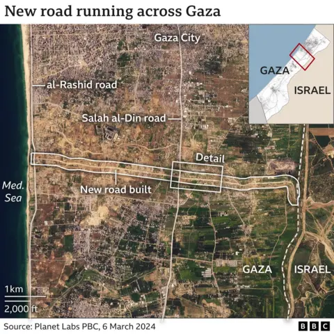 A satellite image showing the new road running across Gaza