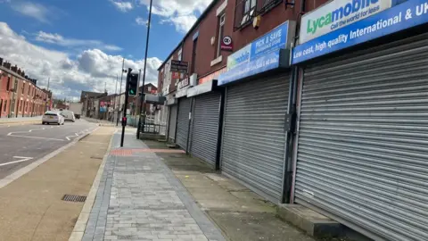 Parade of shops on Manchester Road, Castleton, Rochdale