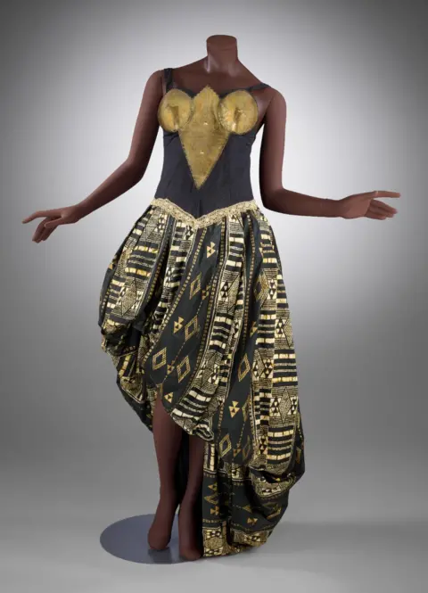 Africa Fashion at the V&A Gold and black dress