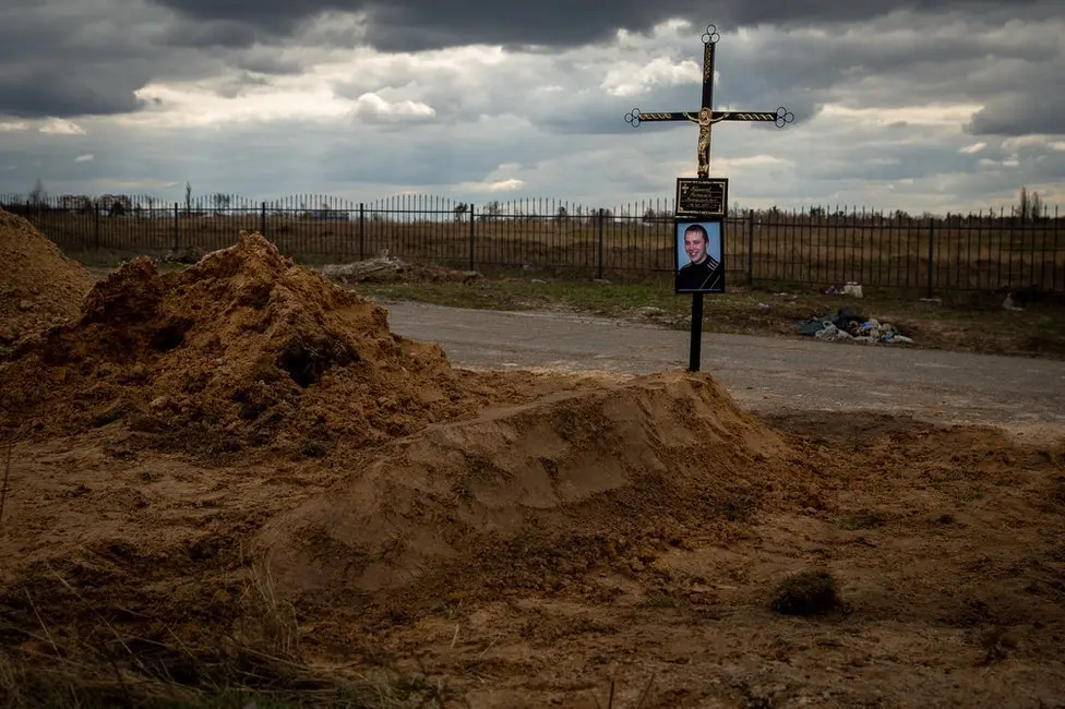 BBC Vitaliy Brezhnev was buried on Monday 11 April, in a fresh grave by the road