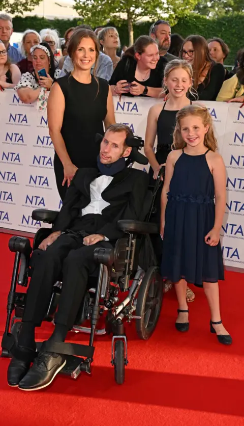 Getty Images Rob Burrow and family