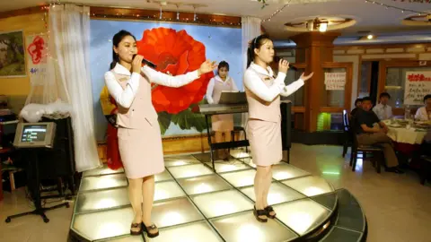 Getty Images North Korean waitresses at a restaurant in China