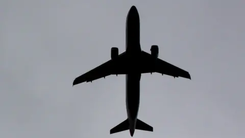 BBC Plane in silhouette
