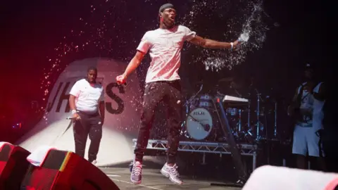 Joseph Okpako/Getty Images J Hus performing at Parklife