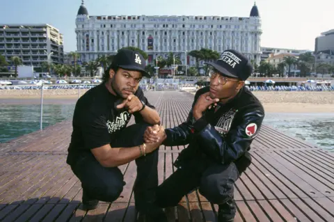 Getty Images Ice Cube and John Singleton