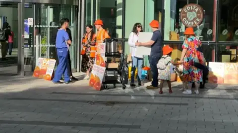 Picket lines outside QE hospital