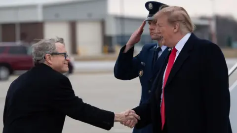 Getty Images Mike DWine and Donald Trump