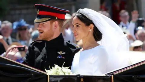 PA Prince Harry and Meghan Markle