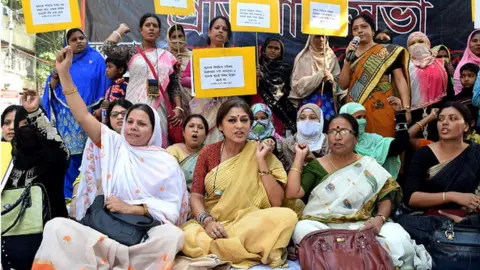 Getty Images Roopa Ganguly (C) MP and President of West Bengal BJP Women Cell along Actress Loket Chatterjee, Supporting the efforts for imposition of Uniform Civil Code and agitating over the triple talaq, Bharatiya Janata Party (BJP) women's cell- BJP Mahila Morcha- held a rally on November 18, 2016 in Kolkata, India.