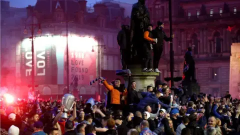 PA Media Crowds in George Square