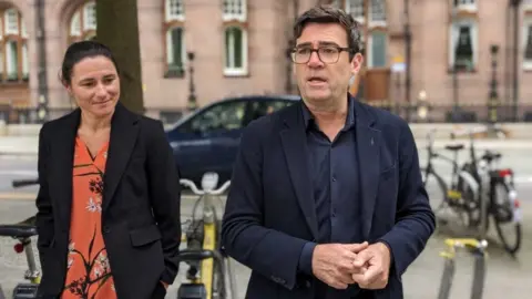 LDRS Greater Manchester mayor Andy Burnham (R) and active travel commissioner Dame Sarah Storey (L)