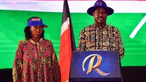 Getty Images Kenya's defeated presidential candidate Raila Odinga (R) speaks during a press conference, flanked by his running mate Martha Karua (L), at the Kenyatta International Convention Centre (KICC) in Nairobi on August 16, 2022