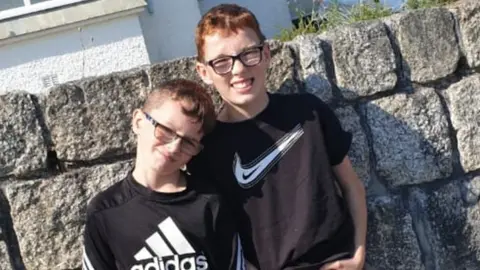 Family handout Brothers Reece, 10, and Joel, 12, are both losing their vision