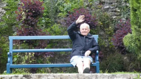 Liam Walsh Mr Walsh's father, Mick, sitting on a bench