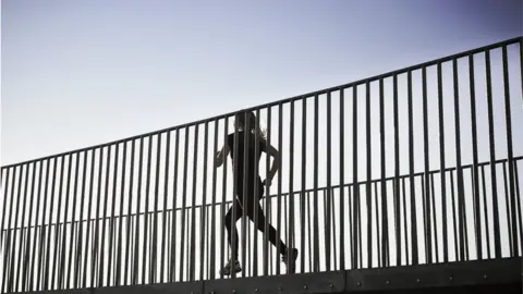 Science Photo Library Runner