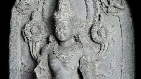 Stele carved from black chlorite representing Surya, the Hindu deity of the sun