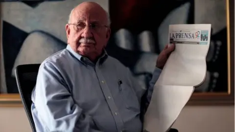 AFP Jaime Chamorro Cardenal, president of La Prensa Editorial Group, holds an edition of La Prensa newspaper, which on January 18, 2019 published its cover in blank