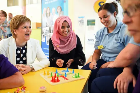 Getty Images Scotland's First Minister Nicola Sturgeon meets NHS staff and patients at the Royal Hospital for Children in Glasgow