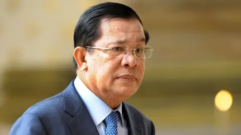 Getty Images Cambodian Prime Minister Hun Sen walks into the National Assembly meeting in Phnom Penh on March 19, 2015.