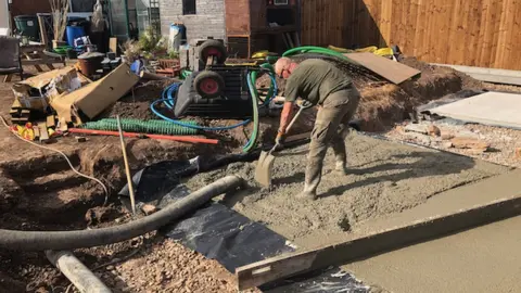 Richard completing work on his garden