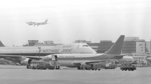 Getty Images Dragonair's inaugural flight at Hong Kong's Kai Tak airport in 1985.