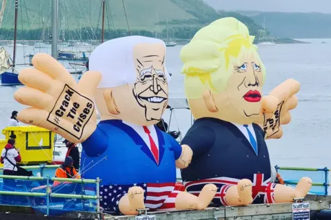 Inflatable Boris Johnson and Joe Biden