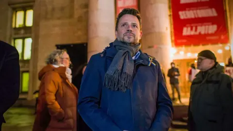 Getty Images Warsaw's mayor Rafal Trzaskowski at a "Warsaw in solidarity with Ukraine" demonstration on 17 February