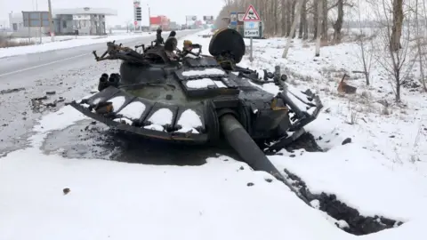 Getty Images A blown-off tank turret lies on the ground on the outskirt of Kharkiv