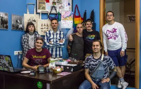 BBC Anya, Igor, Iiuri, Nikita, Danya and staff members at Llamas vegan shop in St Petersburg