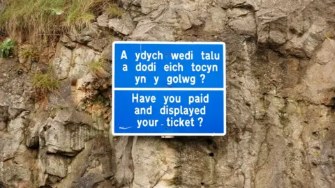 Getty Images Bilingual parking sign