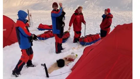 SUPPLIED Isla Fosbury [right] with her friends setting up camp with the Polar Academy in Greenland
