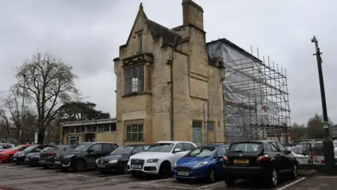 Cotswold District Council The Old Station in Cirencester, surrounded by scaffolding to the rear