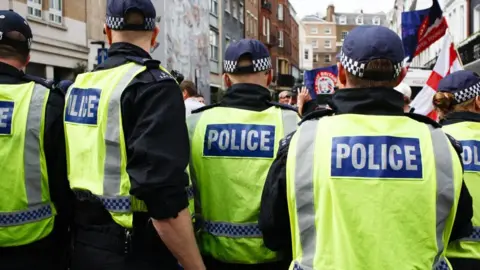 Getty Images Metropolitan Police Officers in Central London