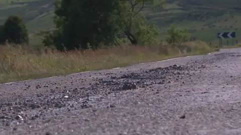 Melted tarmac on road