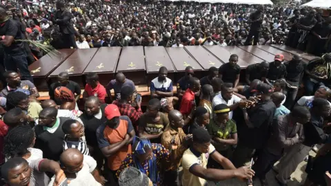 AFP Coffins arrive at Ibrahim Babanginda Square in the Benue State capital Makurdi, on January 11, 2018