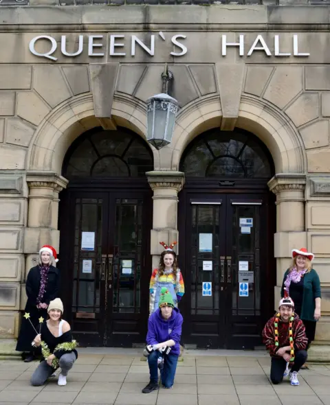 Jonathan Bradley The cast of the Queen's Hall Christmas show outside the building