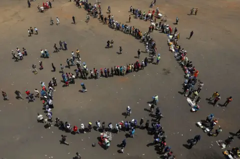 Reuters Mourners arrive at Rufaro stadium, in Mbare township where the body of Zimbabwe"s founder Robert Mugabe will lie in state, Harare, Zimbabwe, September 12, 2019